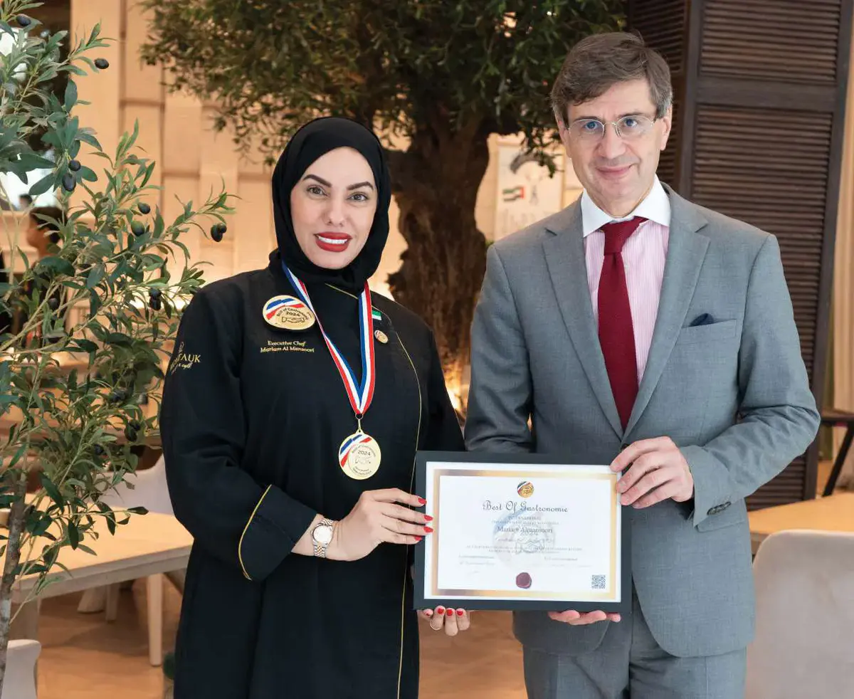 The Golden Chef medal presented by the French Ambassador to the UAE